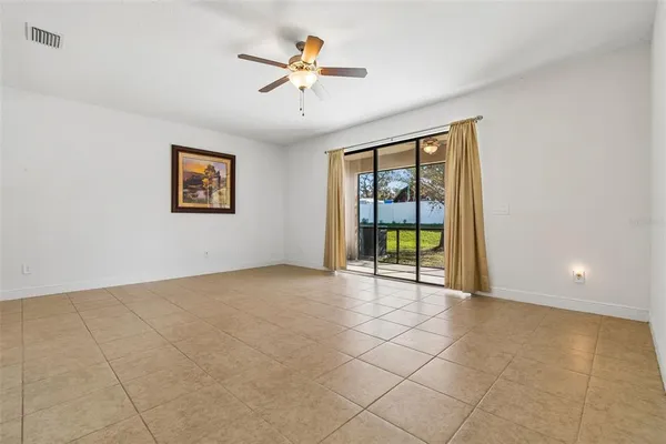 a view of backyard with a garden and plants