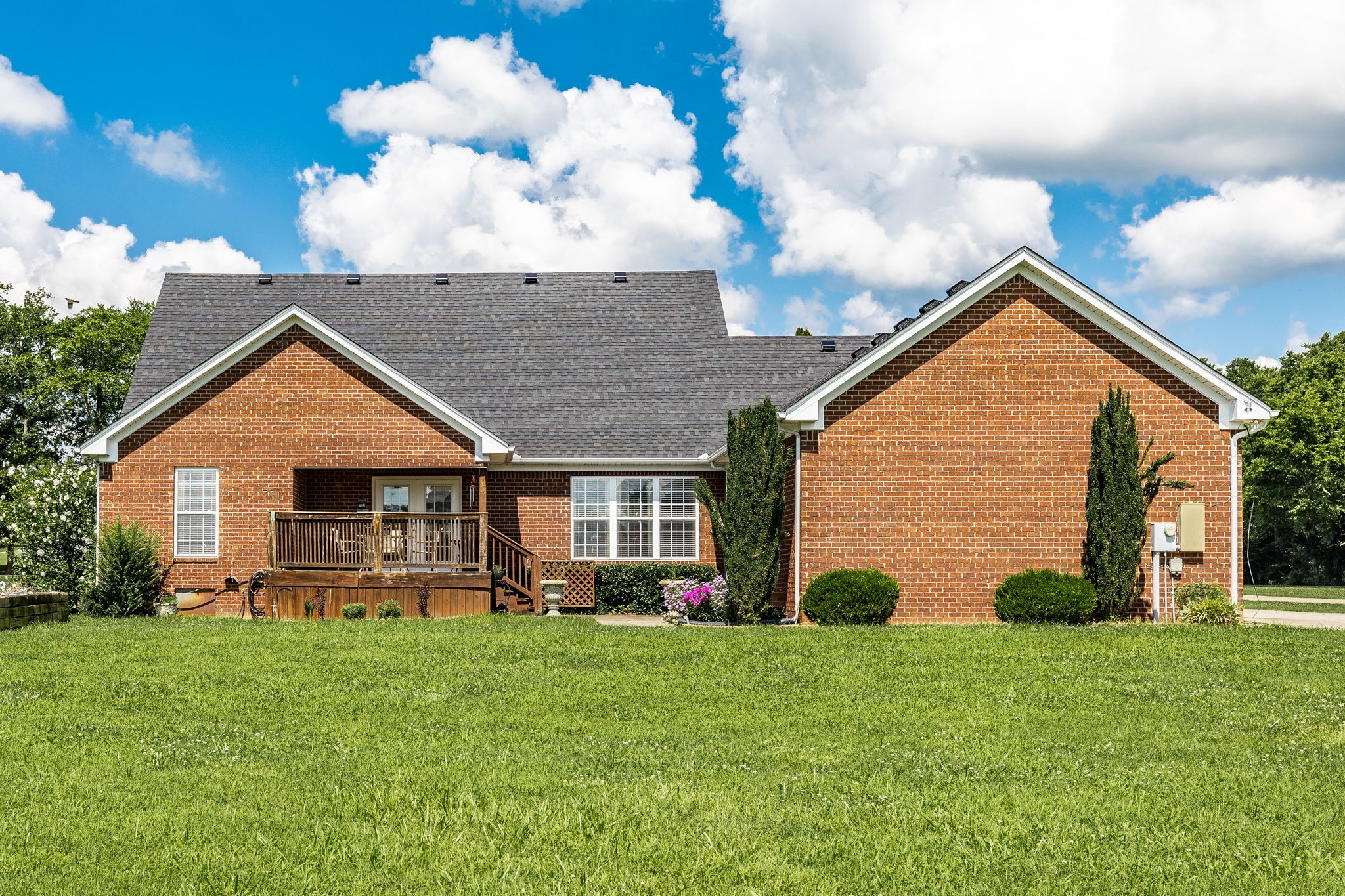 310 Rock Bridge Road Gallatin, TN 37066 - Photo 7 of 43 a view of a house with backyard and garden