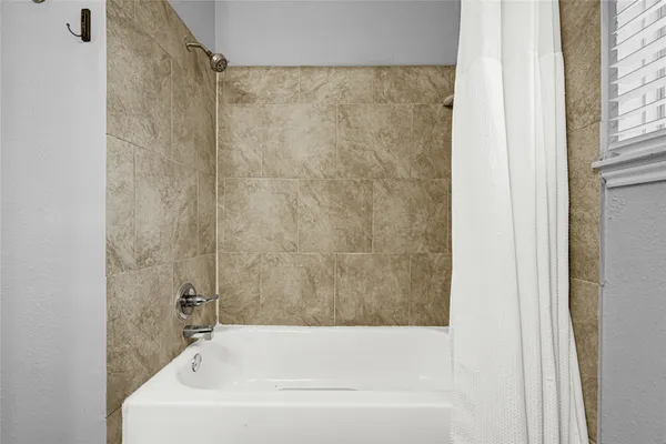 a bathroom with a bathtub