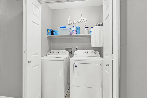 a utility room with dryer and washer