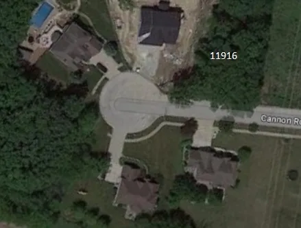 an aerial view of a house with outdoor space swimming pool and outdoor seating