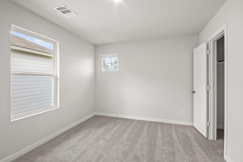 496 Shoreview Drive Conroe, TX 77303 - Photo 16 of 20 a view of an empty room with a window