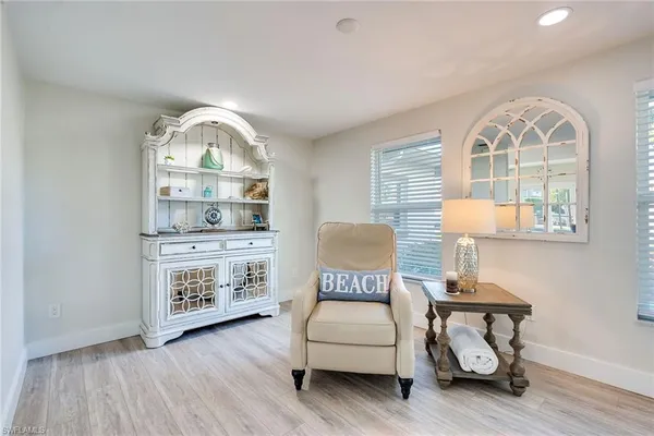 a kitchen with granite countertop a sink stainless steel appliances and cabinets