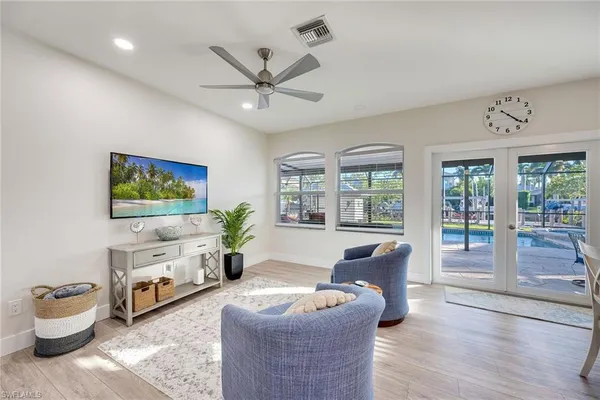 a living room with furniture and a table