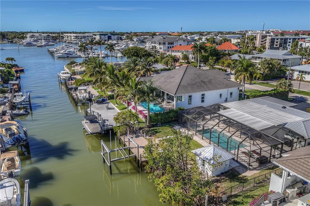 1410 Curlew Avenue Naples, FL 34102 - Photo 43 of 44 an aerial view of a house with a lake view