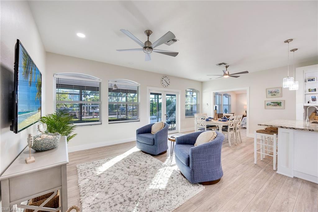 1410 Curlew Avenue Naples, FL 34102 - Photo 4 of 44 a living room with furniture and a large window