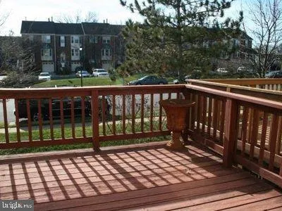 a view of a wooden roof deck