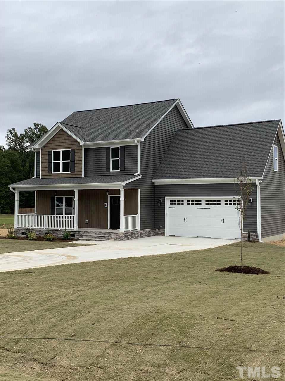 7829 Creech Road Middlesex, NC 27557 - Photo 17 of 18 Freshly sodded and landscaped front yard...beautiful!