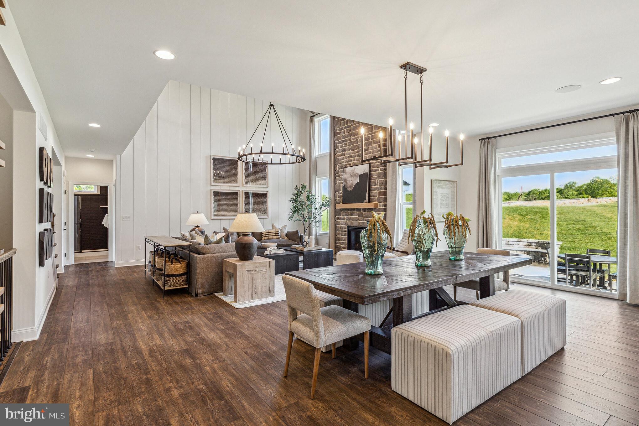 4441 Taviston Court East Emmaus, PA 18049 - Photo 22 of 49 a living room with fireplace furniture and a large window