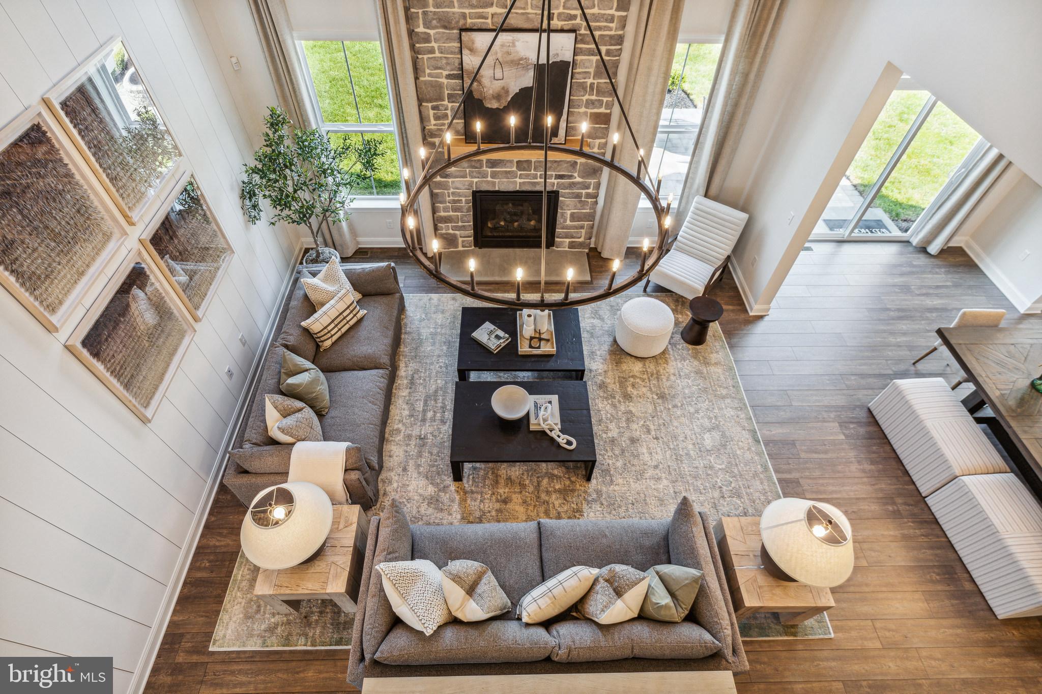 4441 Taviston Court East Emmaus, PA 18049 - Photo 27 of 49 a living room with furniture and a fireplace