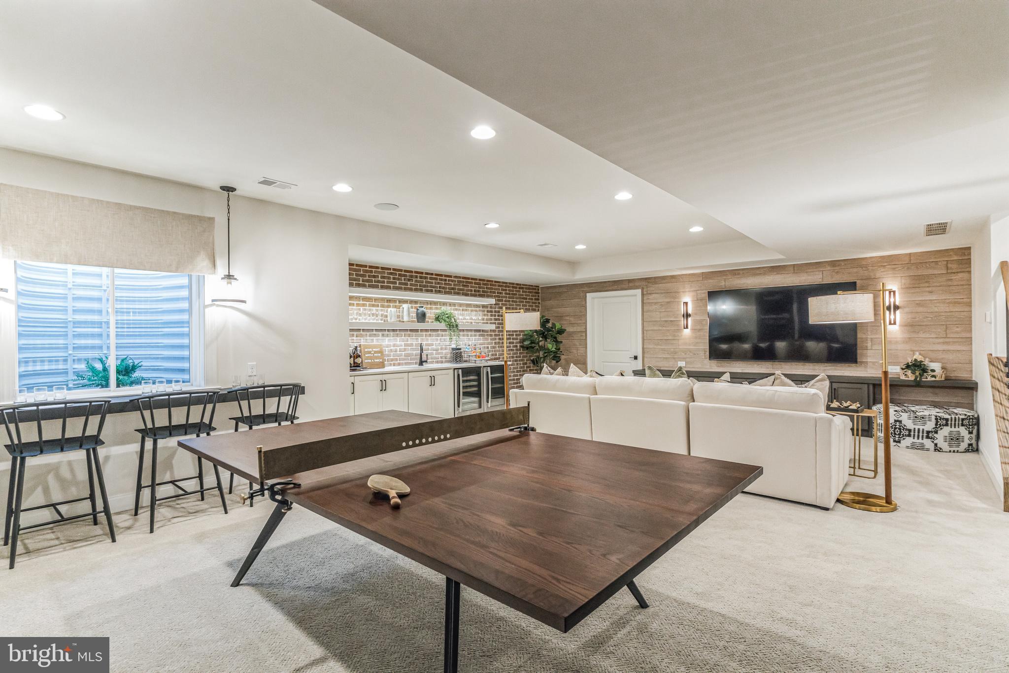 4441 Taviston Court East Emmaus, PA 18049 - Photo 44 of 49 a living room with furniture a table and chairs