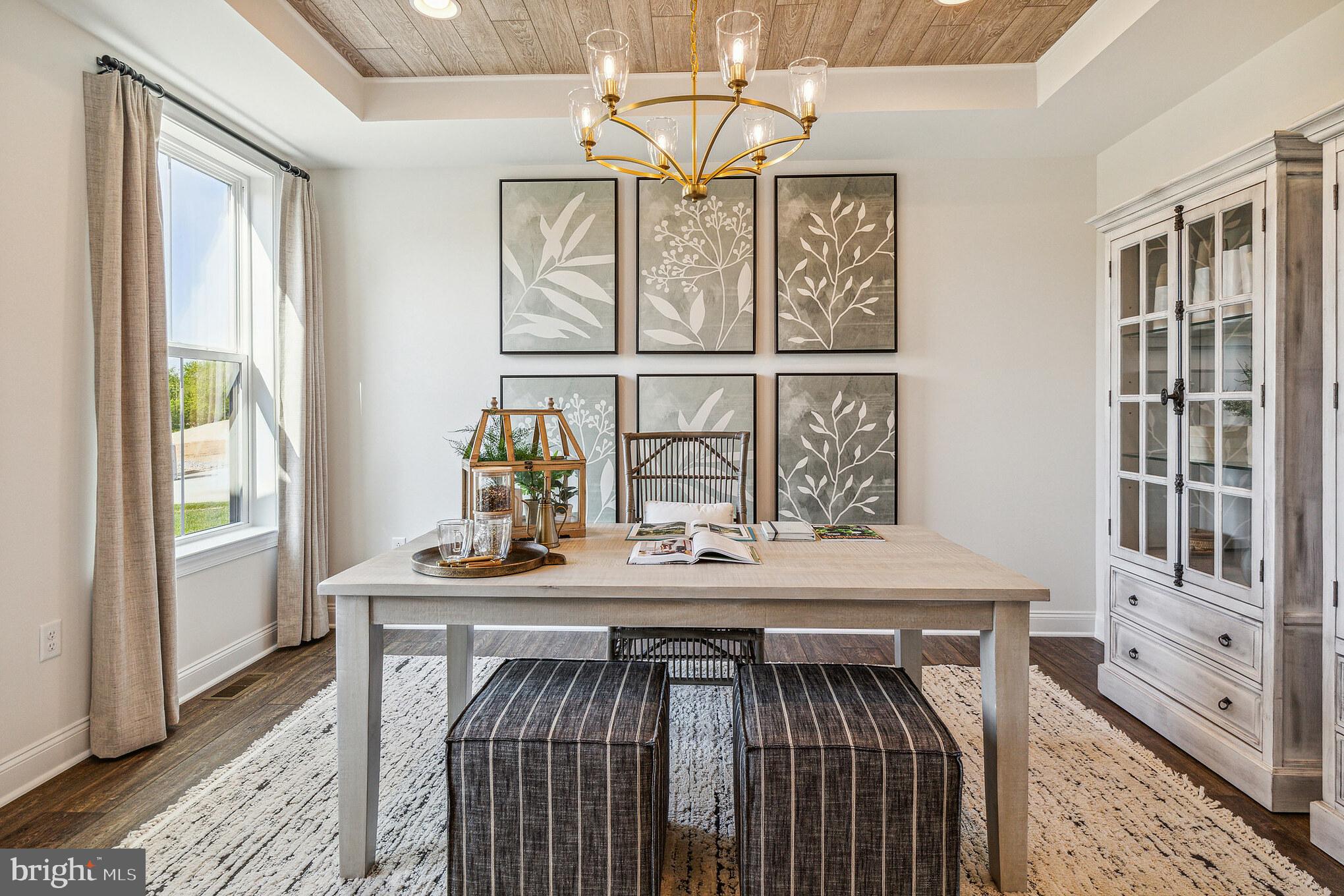 4441 Taviston Court East Emmaus, PA 18049 - Photo 7 of 49 a view of a dining table with chairs