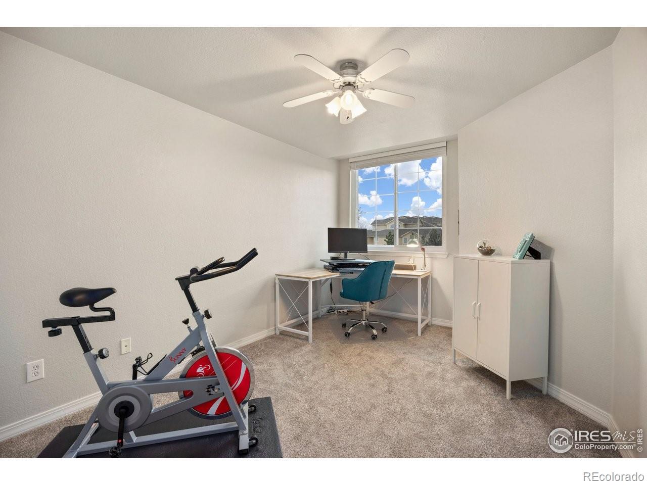 4500 Seneca Street, Unit 66 Fort Collins, CO 80526 - Photo 16 of 20 a view of a room with gym equipment