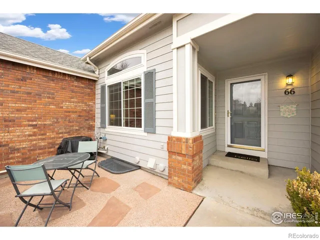 a balcony with furniture and window
