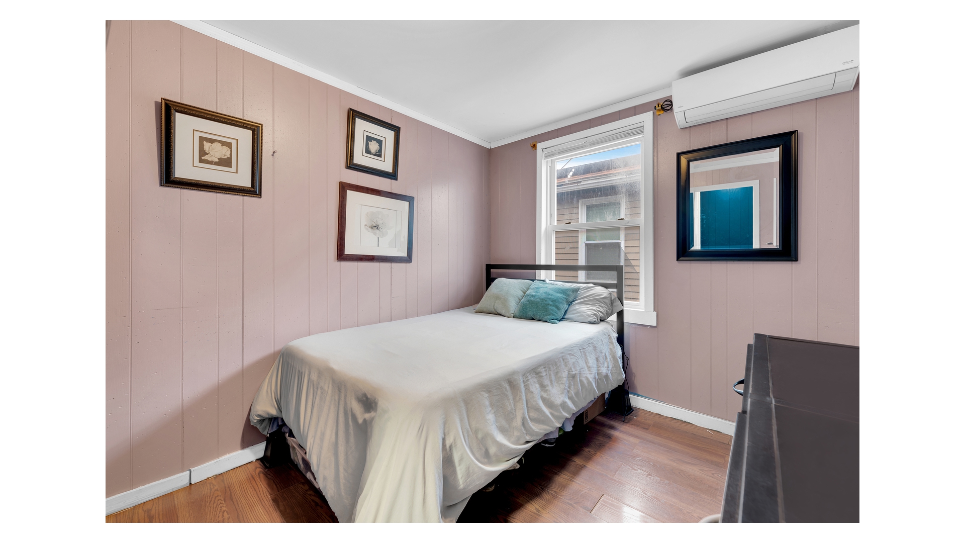 1546 Canarsie Road Brooklyn, NY 11236 - Photo 10 of 15 a bedroom with a bed and a window