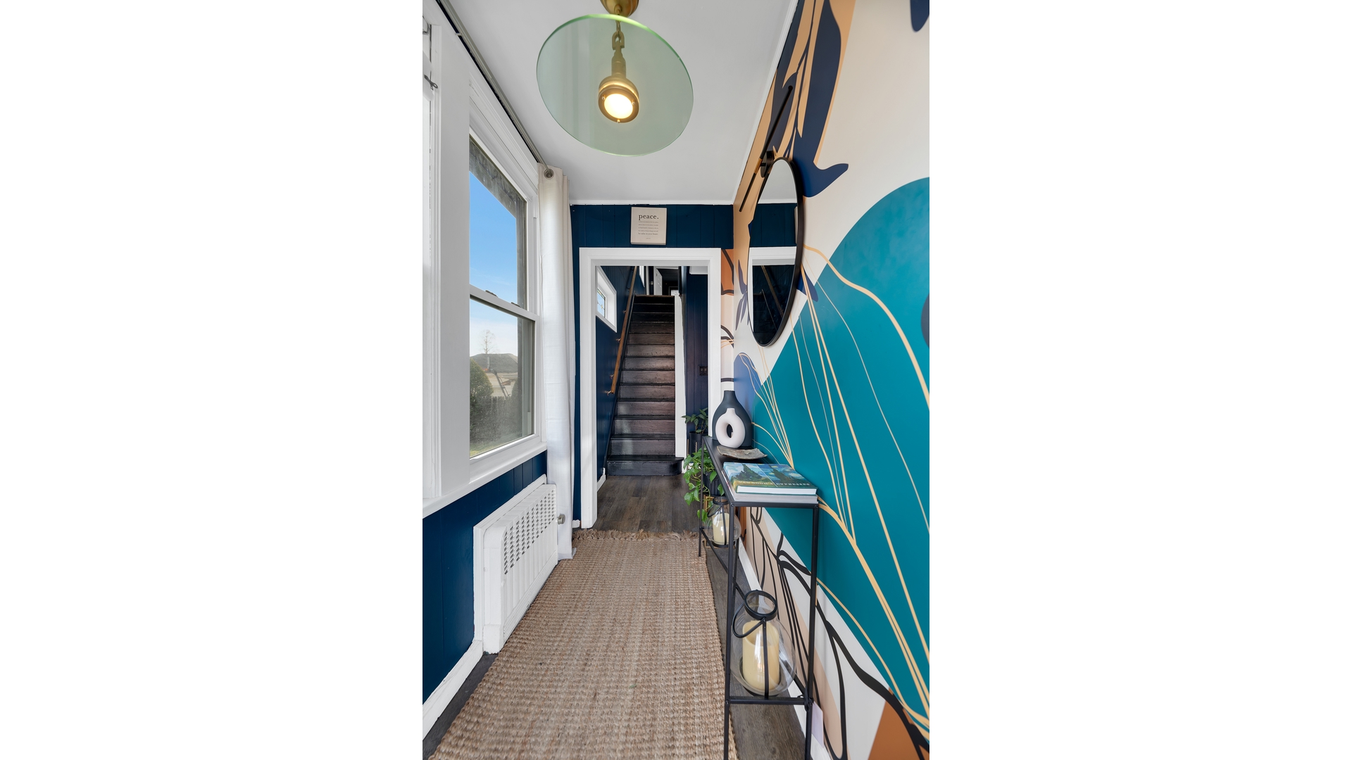 1546 Canarsie Road Brooklyn, NY 11236 - Photo 2 of 15 a view of a hallway with wooden floor