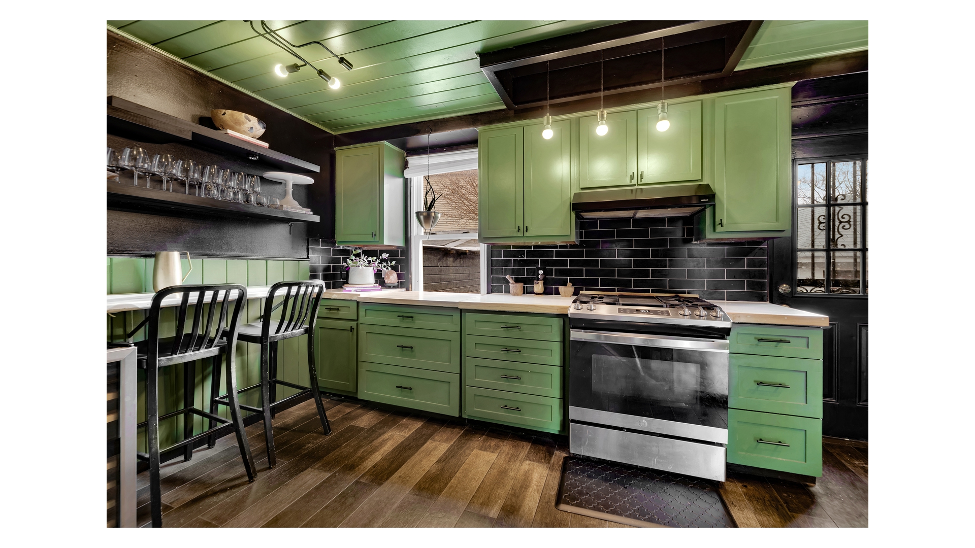 1546 Canarsie Road Brooklyn, NY 11236 - Photo 6 of 15 a kitchen with a stove and a wooden floors