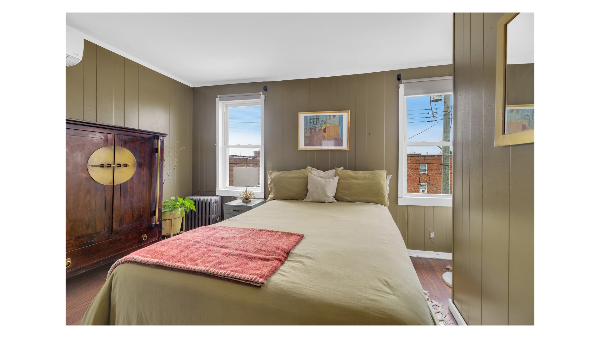 1546 Canarsie Road Brooklyn, NY 11236 - Photo 8 of 15 a bedroom with a bed and a dresser with mirror