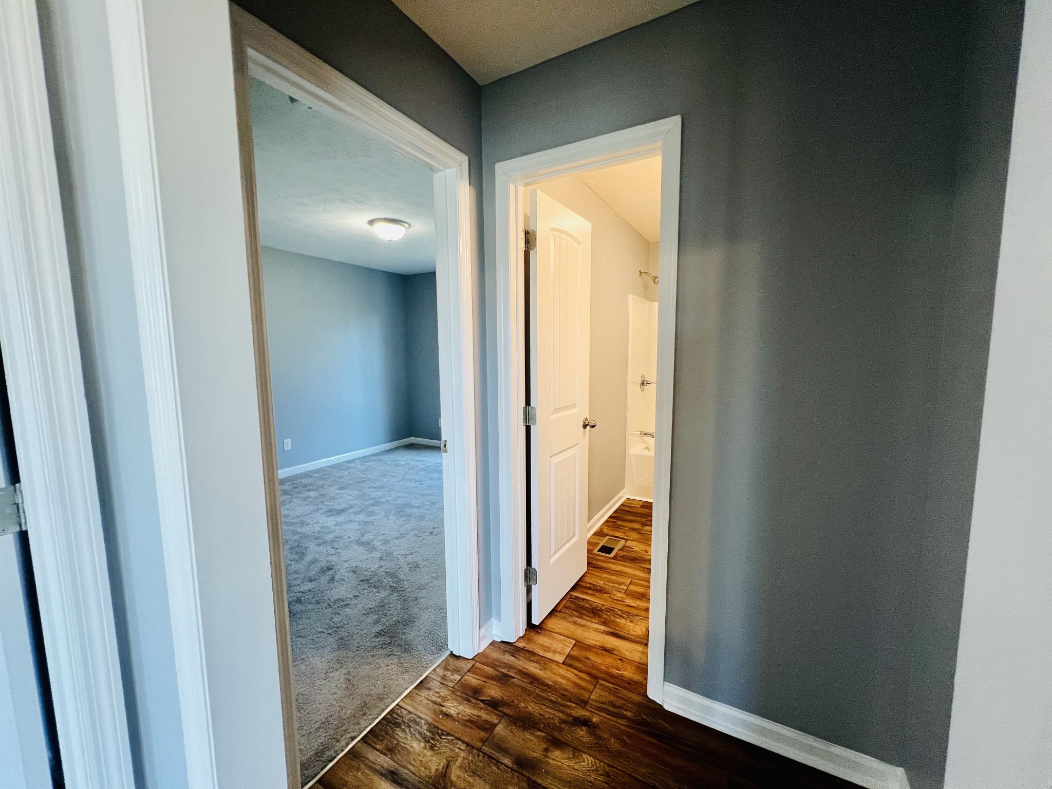 299 B Union Hollow Road Fayetteville, TN 37334 - Photo 22 of 27 a view of a hallway with wooden floor and staircase