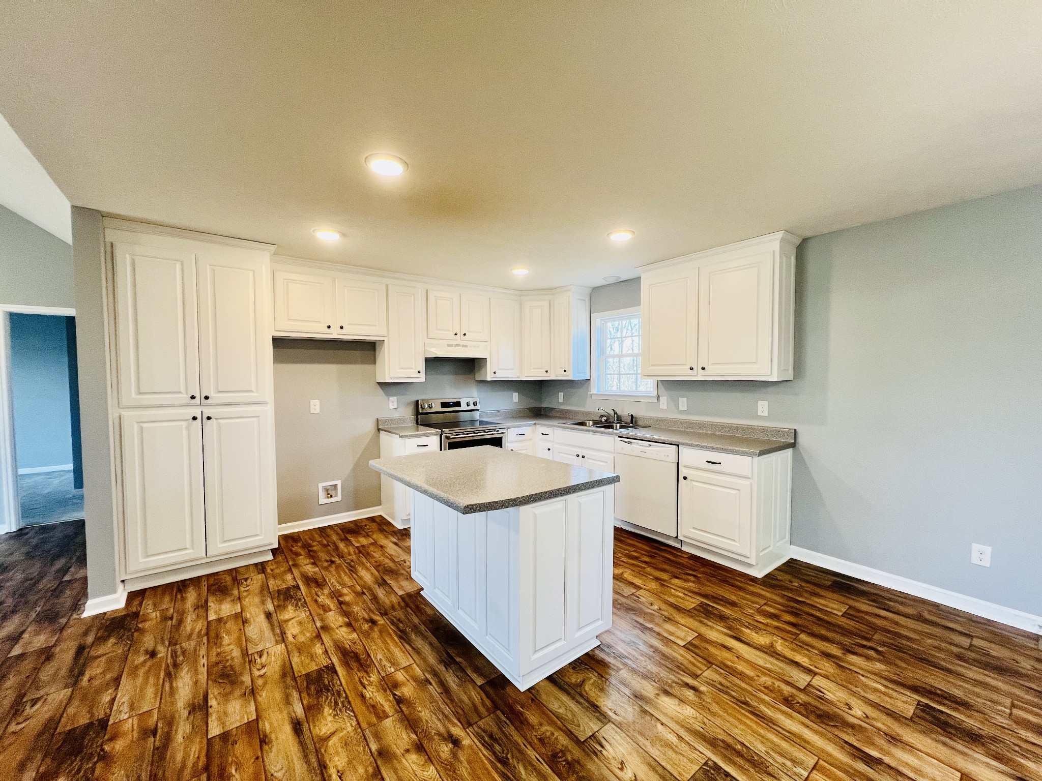 299 B Union Hollow Road Fayetteville, TN 37334 - Photo 5 of 27 a kitchen with stainless steel appliances granite countertop a sink and a refrigerator