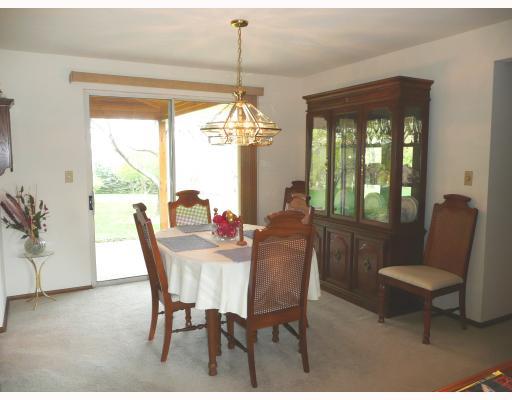 6963 Crider Road Mars, PA 16046 - Photo 4 of 8 Dining Room. The sliding glass door in the dining room ushers you to the fabulous roofed patio where you will enjoy outdoor dining on warm summer days.
