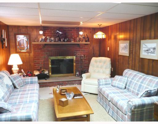 6963 Crider Road Mars, PA 16046 - Photo 7 of 8 Den/Family/Great Room. Cold winter evenings will be warmed by the log burning fireplace in the cozy lower level family room. This is a great place to gather with family and friends--it even has a built-in bar!