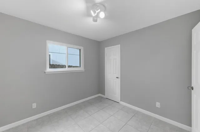 a view of a backyard of the house