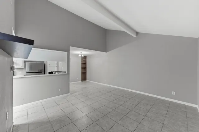 a view of a kitchen with a sink