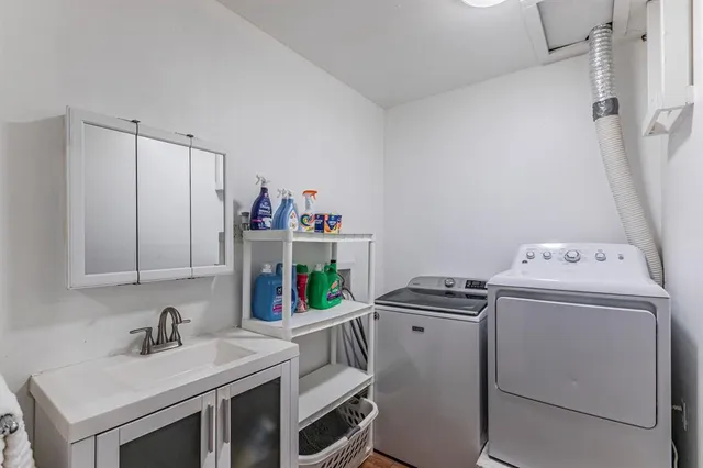 a utility room with dryer and washer