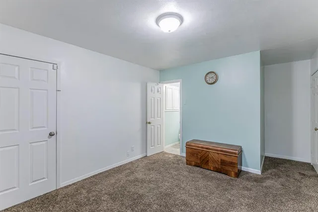 a view of a livingroom with furniture