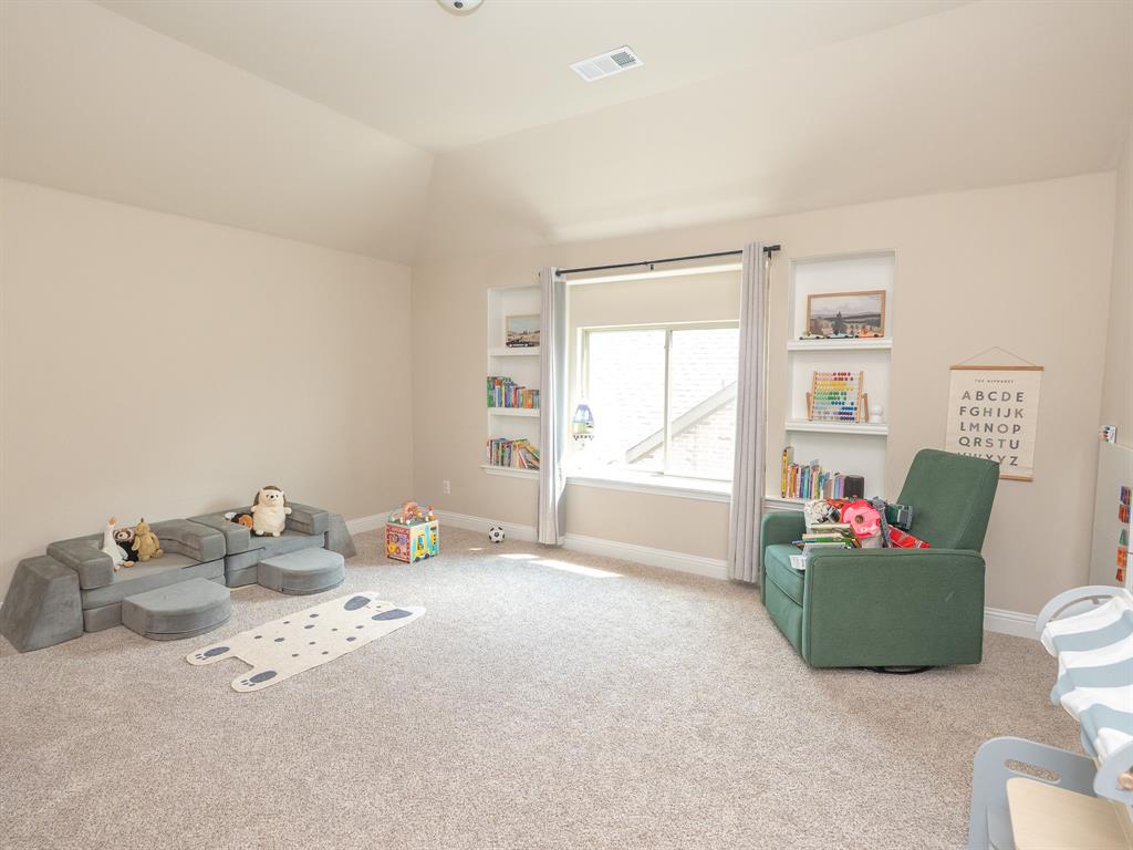 216 Nathan Drive Princeton, TX 75407 - Photo 11 of 12 a living room with furniture and a window