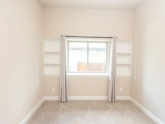 an empty room with a window