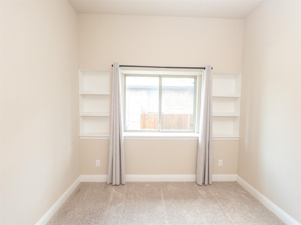 216 Nathan Drive Princeton, TX 75407 - Photo 8 of 12 an empty room with a window