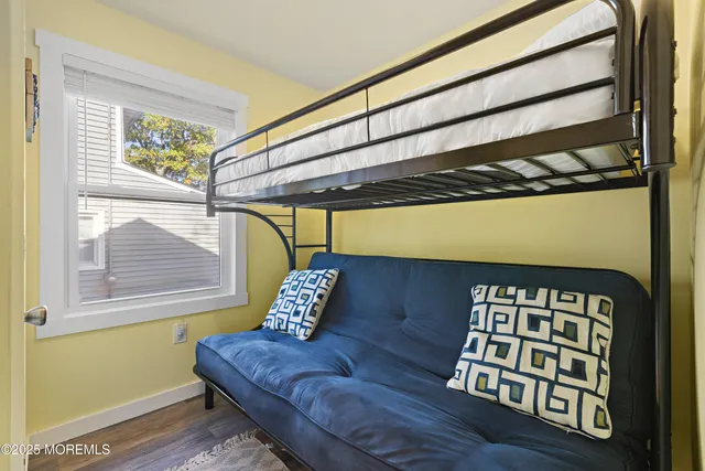 a view of sitting area with furniture and window