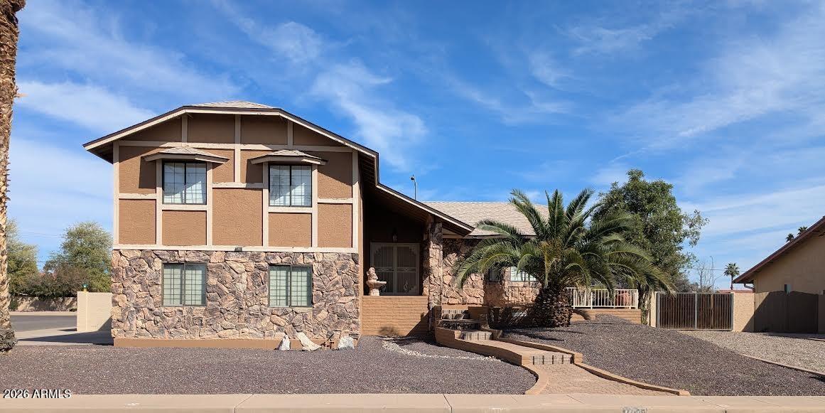 1341 North Pomeroy Mesa, AZ 85201 - Photo 1 of 32 a front view of a house with a yard