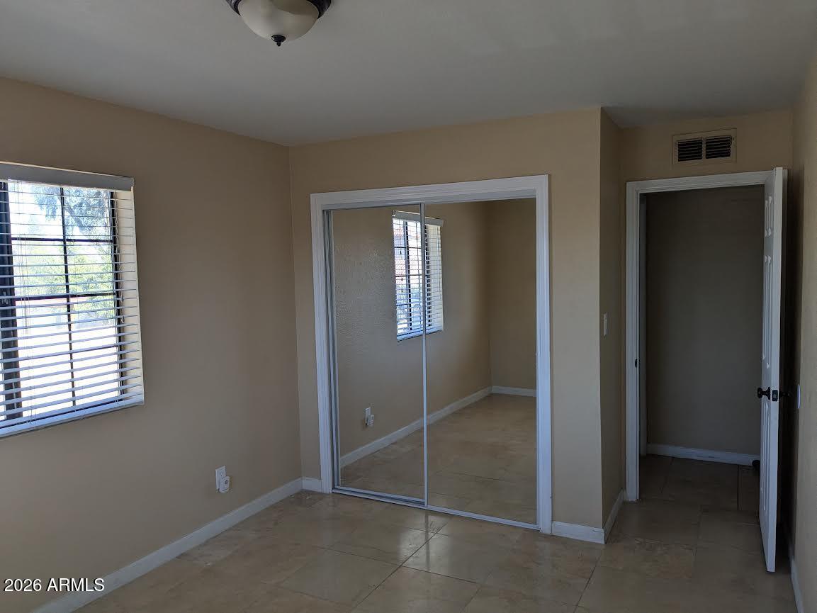 1341 North Pomeroy Mesa, AZ 85201 - Photo 14 of 32 an entryway view with wooden floor