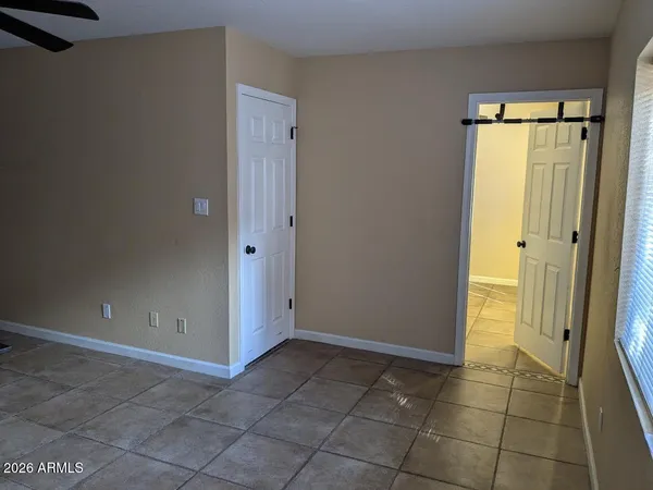 an empty room with windows