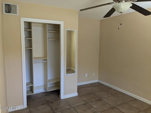 a bathroom with a shower and a toilet