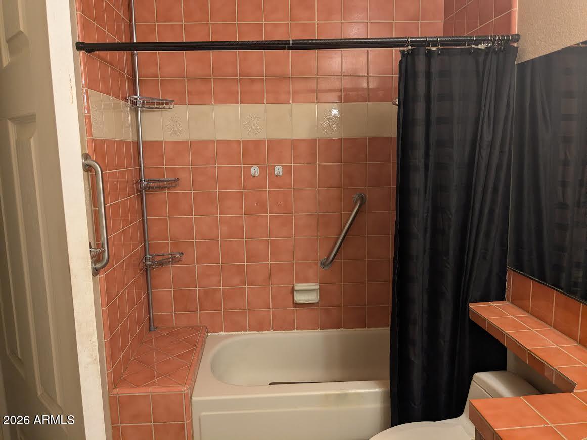 1341 North Pomeroy Mesa, AZ 85201 - Photo 22 of 32 a bathroom with a shower and a toilet