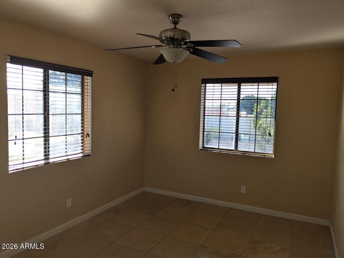 1341 North Pomeroy Mesa, AZ 85201 - Photo 25 of 32 an empty room with a window