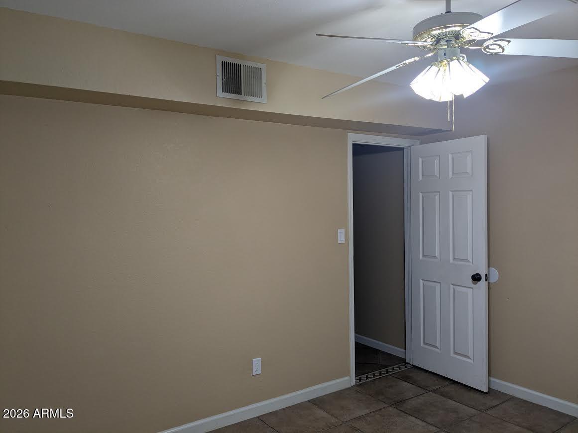 1341 North Pomeroy Mesa, AZ 85201 - Photo 27 of 32 wooden floor in an empty room