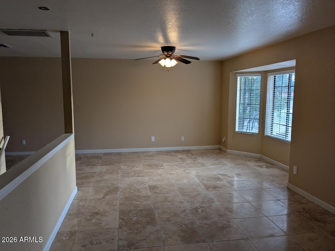 1341 North Pomeroy Mesa, AZ 85201 - Photo 4 of 32 a view of an empty room with a window