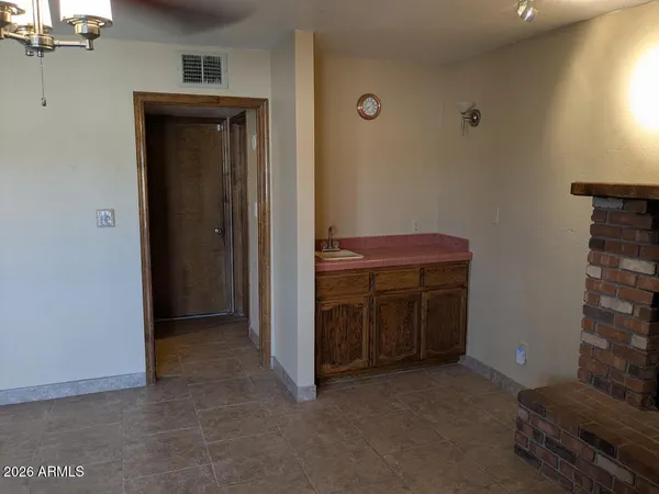 a view of room with washer and dryer