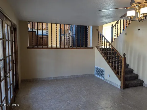 a view of an entryway with staircase