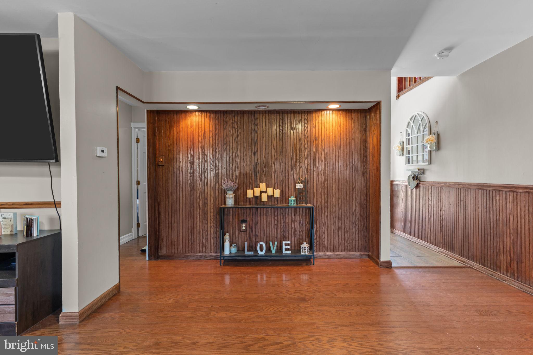 21 Downhill Road Levittown, PA 19056 - Photo 15 of 28 a view of a room with wooden floor and front door