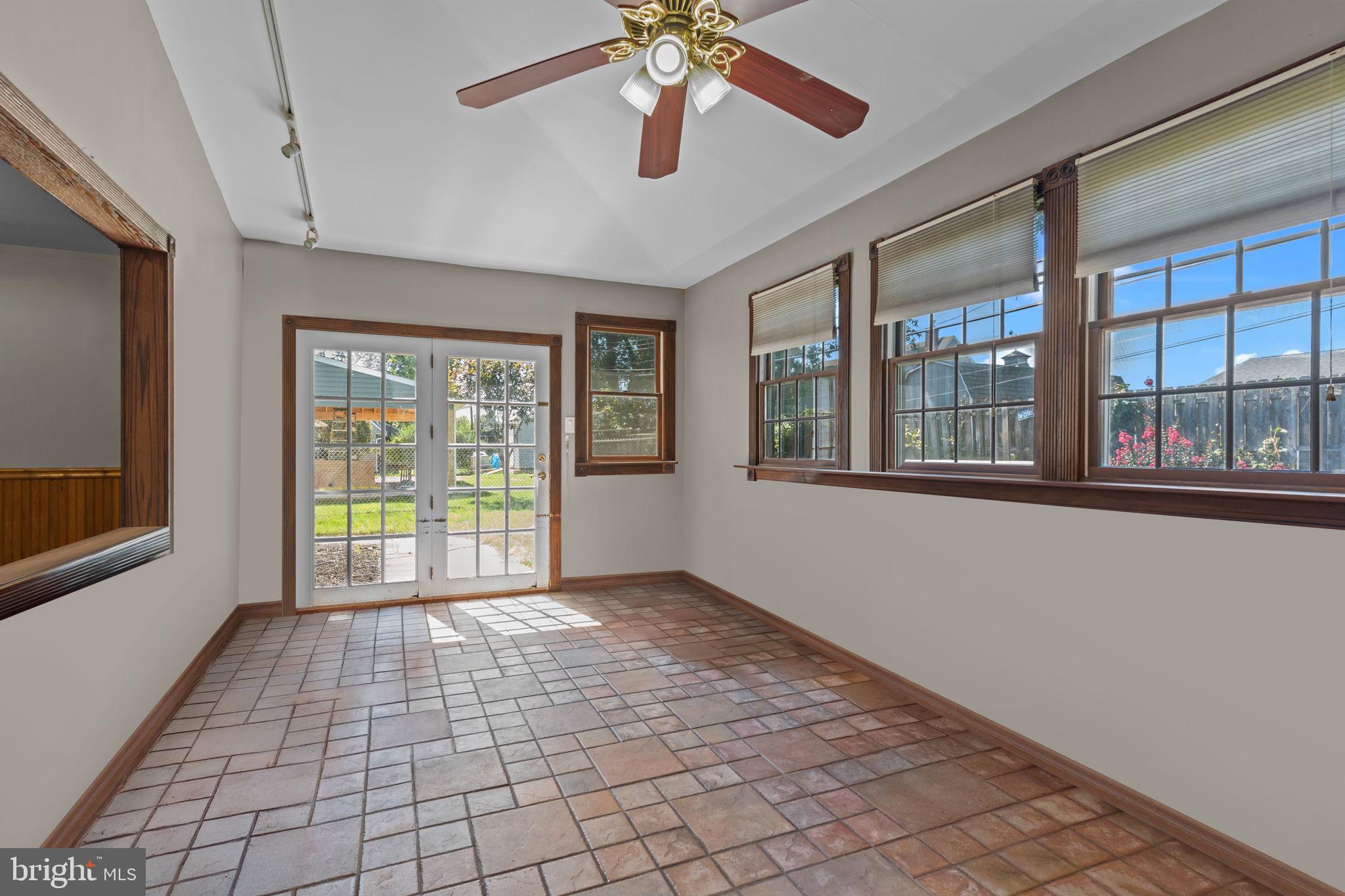 21 Downhill Road Levittown, PA 19056 - Photo 9 of 28 a view of an empty room with window chandelier
