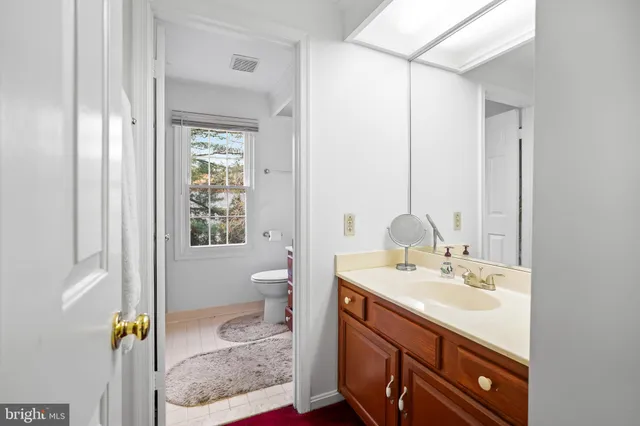 a view of a bathtub & door