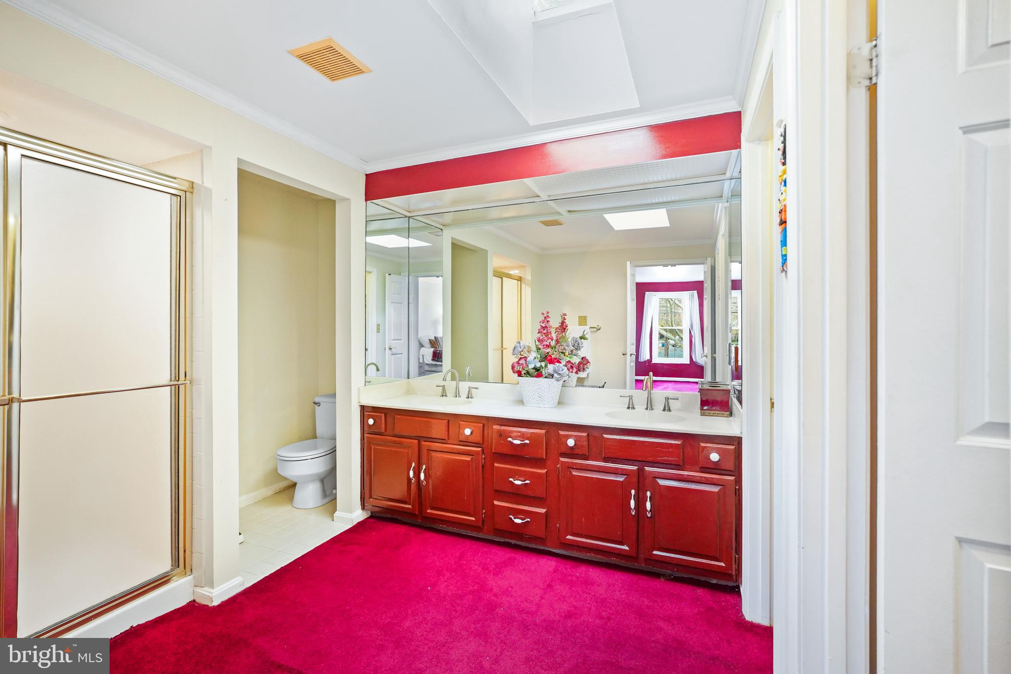 13940 Alderton Road Silver Spring, MD 20906 - Photo 20 of 41 a en suite bathroom with a sink and a mirror