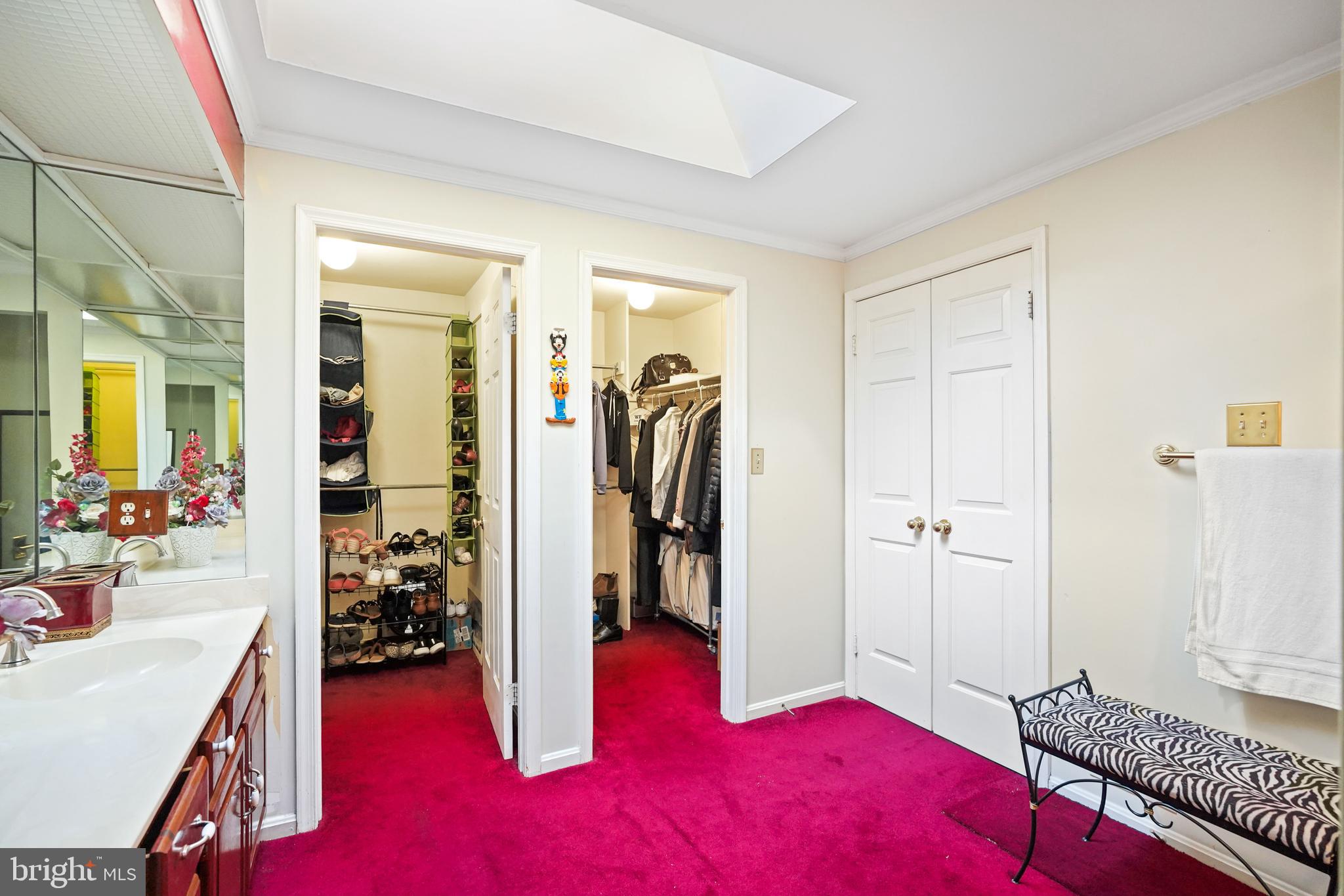 13940 Alderton Road Silver Spring, MD 20906 - Photo 21 of 41 a bedroom with a bed and a dresser