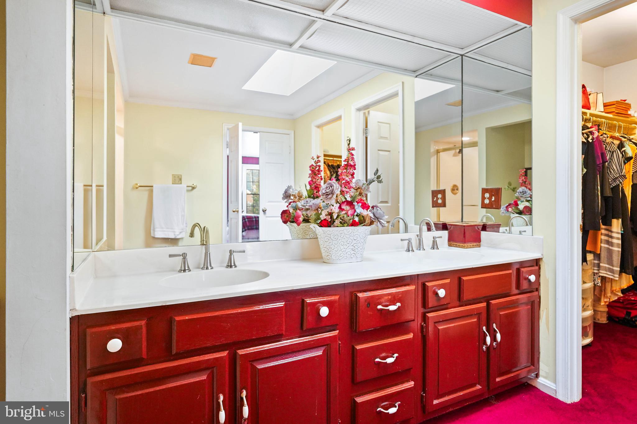 13940 Alderton Road Silver Spring, MD 20906 - Photo 22 of 41 a bathroom with a sink and a mirror
